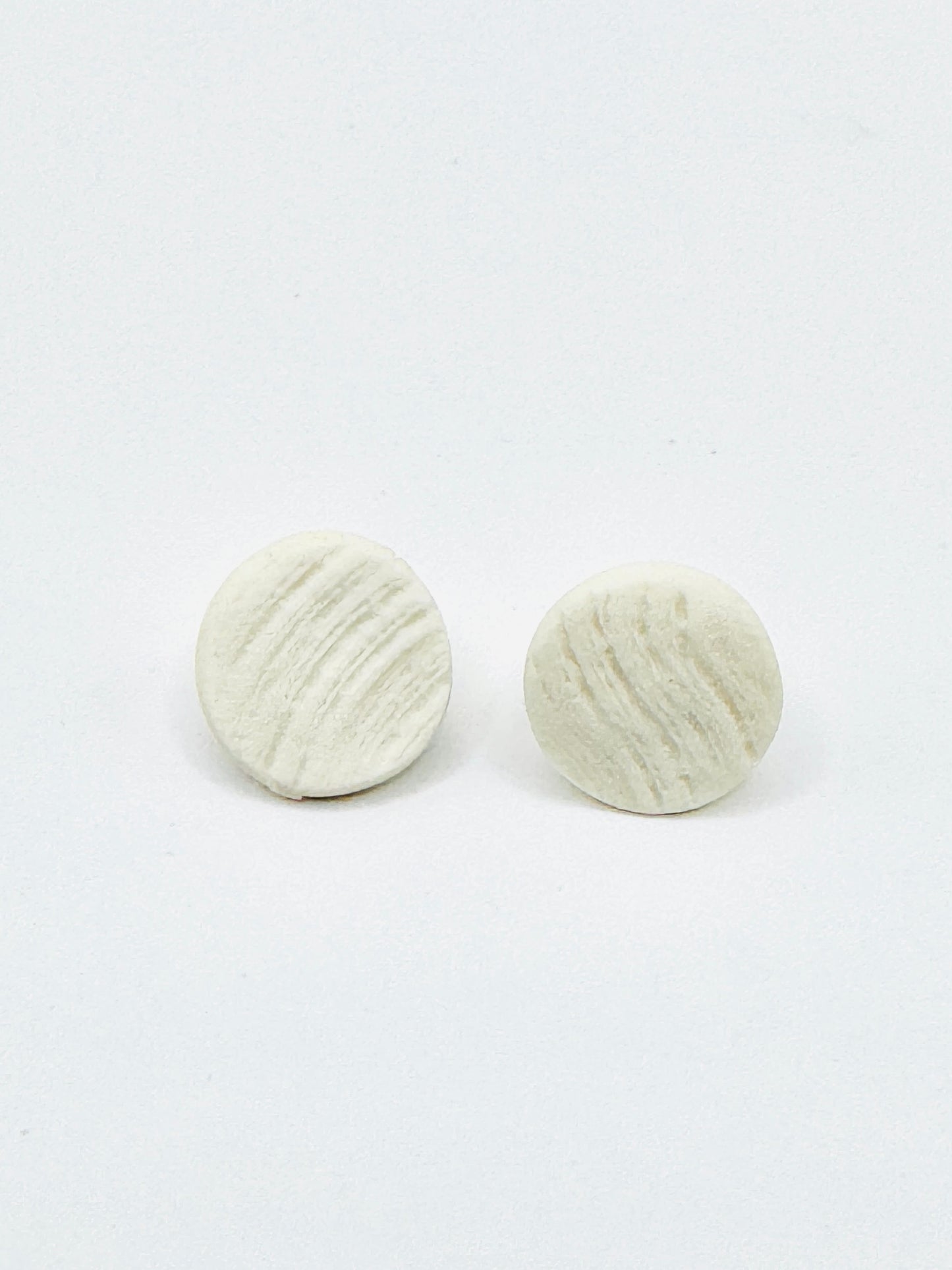 Puces d’oreilles en porcelaine
