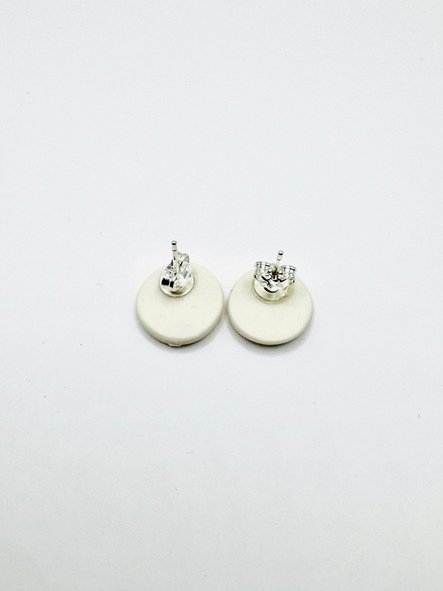 Puces d’oreilles en porcelaine